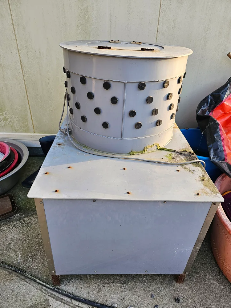 닭털 뽑는 기계