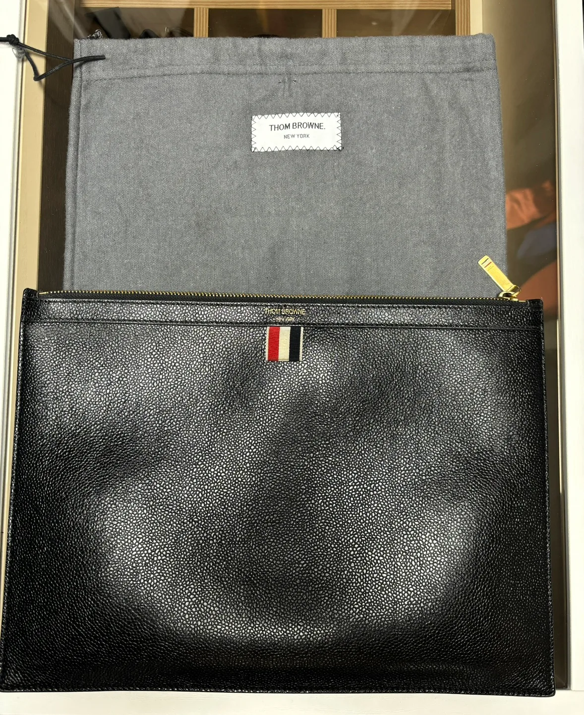 톰브라운 클러치 팝니다.